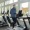 A man running on a treadmill in front of a window