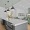 A spacious dining room area with a white countertop