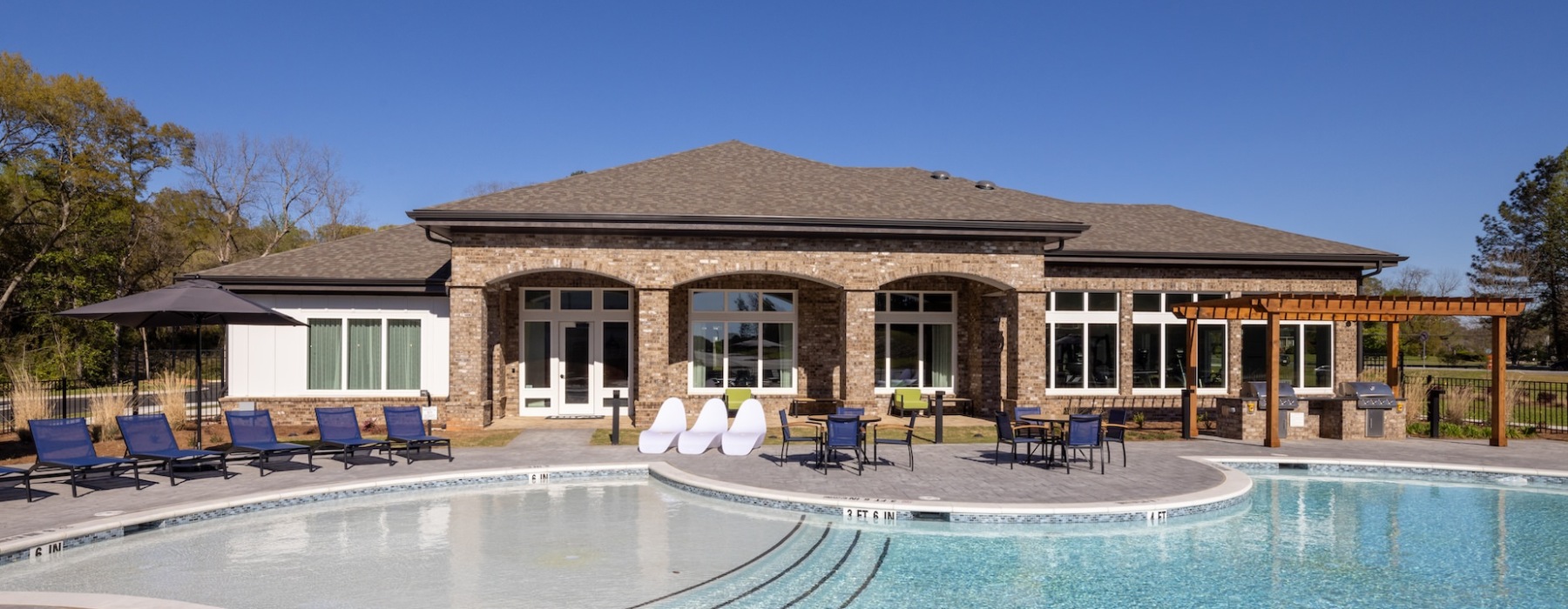 Resort Style Pool with Sun Shelf Seating Area